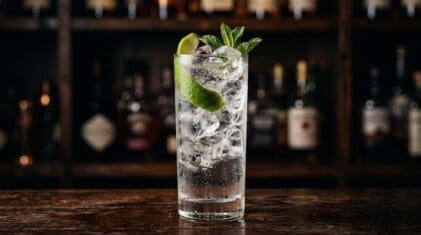 Banana Slush Punch cocktail in tall highball glass with ice