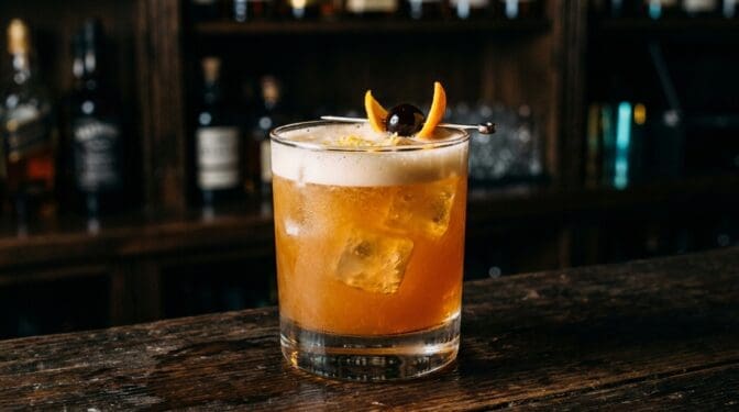Black Apple cocktail in glass