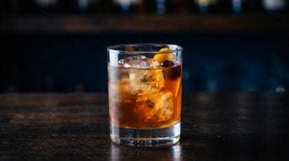 Cider Cup cocktail in rocks glass with clear ice