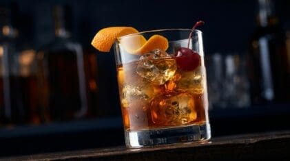 Ciderific cocktail in rocks glass with clear ice