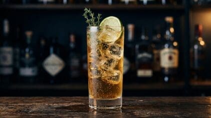 College Hulk Punch cocktail in tall highball glass with ice
