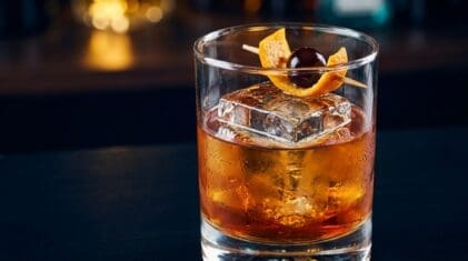 Red Draw cocktail in rocks glass with clear ice