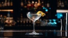 Bone-dry gin martini with lemon twist in a frosted crystal coupe